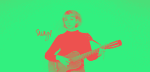 Woman playing guitar duotoned, the background is green and she is red